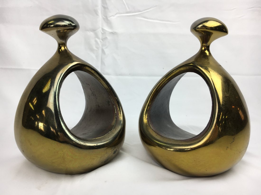 Ben Seibel pair modernist bookends: Here is a lovely pair of modernist bookends by designer Ben Seibel. They are felted on bottom and measure 6.5" x 4". There is a small patch of peeled finish off of one.