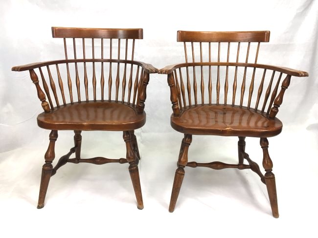 pair Gustav Stickley captain's chairs: Lovely pair of original Gustav Stickley captain's chairs. They are stamped on the bottom and retain their original tags. Each one measures about 25" x 33" x 22". Shipping can be arranged.