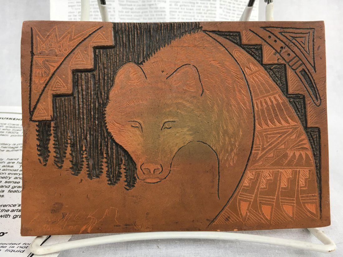 Lawrence M. Crank signed Navajo pottery: Here is a nice flat tile pottery piece by Navajo artist Lawrence Crank. It is inscribed lower left and comes with signed paper about the artist. This piece measures about 3" x 2".