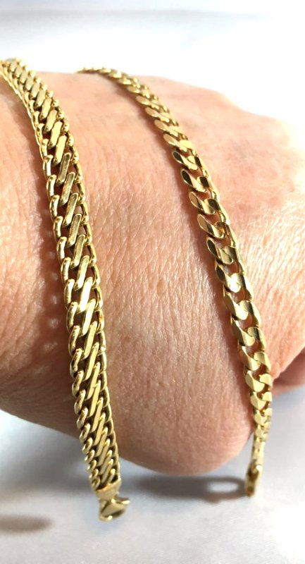 Pair of 14K Italian Gold Curb & S Link Chain Bracelets: 2 flat curb and S-link chain bracelets made of 14K solid gold marked Italy. Each measures 7.5".