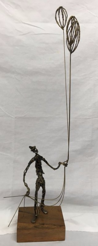 Mid Century Brutalist bronze ballon man sculpture: Here is a dynamic Mid-Century Modern brutalist bronze sculpture of balloon man. It is unsigned on a wooden base. It is fairly large and measures 31" x 10" x 7". This would make a great interior design