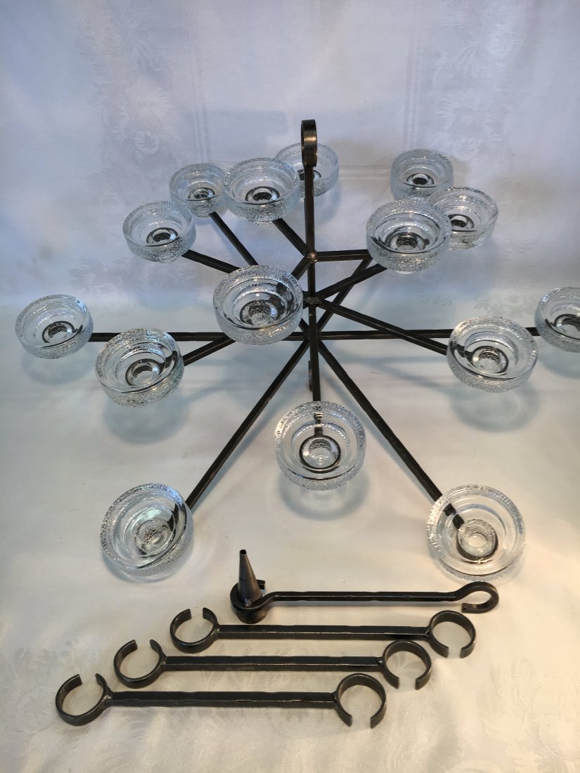 Erik Höglund 15 arm candelabra Swedish Mid Century Mod: A very rare find. Erik Hoglund (1932-1998) chandelier designed and manufactured in Sweden. Our chandelier is in excellent condition and includes the candle snuffer. Each candle holder can use three di