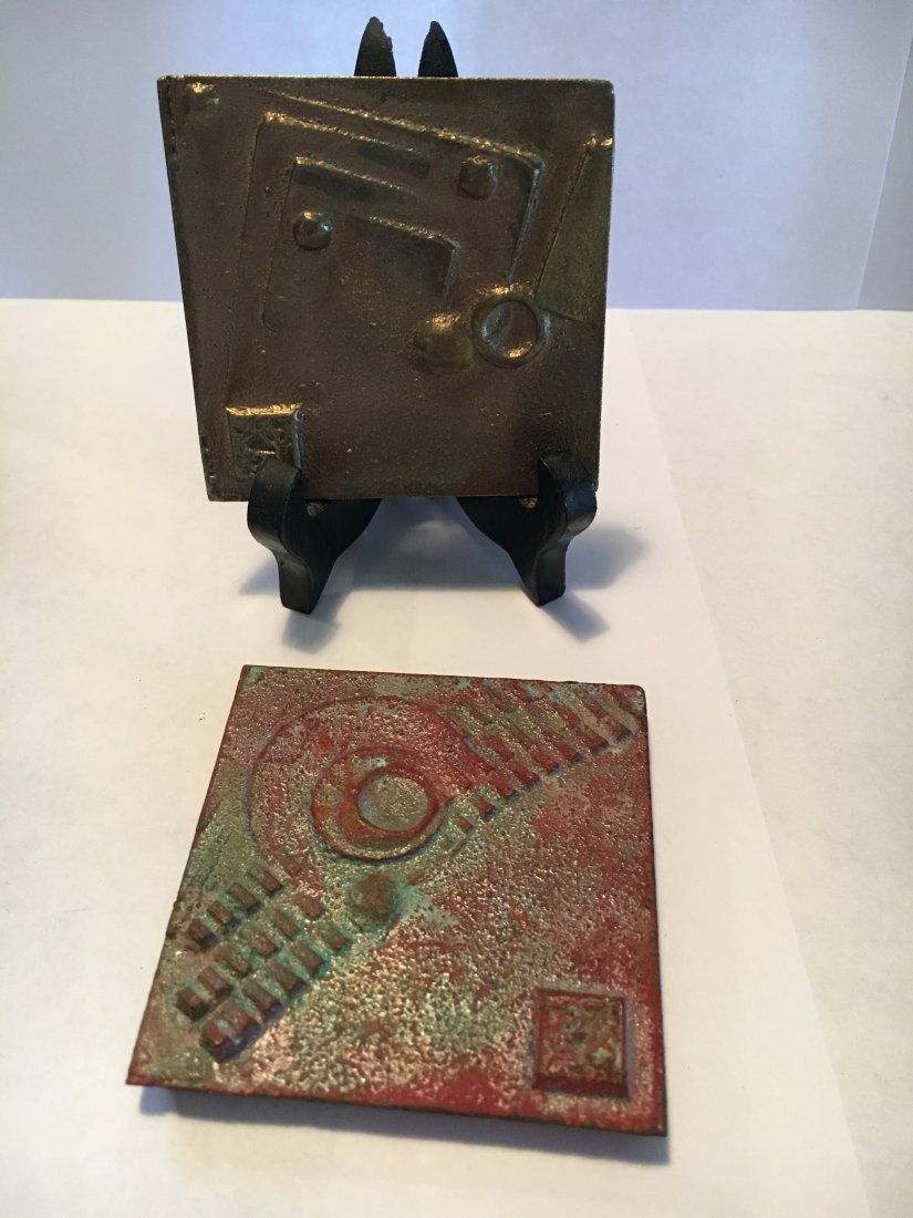 Paolo Soleri brutalist bronze 2 sculptures: Paolo Soleri is famous for his brutalist bronze bells and windchimes. Here are 2 of his original bronze medal sculptures. Both bear his impressed insignia. Measures 2.5" x 2.5" each.