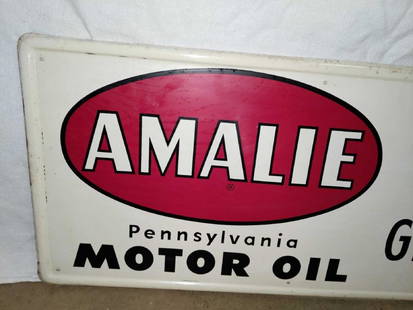 SST Amalie motor oil sign: SST Amalie motor oil sign Has usual wear along edges otherwise excellent condition!! Has some paper marks throughout. Marked G-35. 11 1/2 x 35 1/2