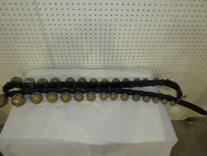 Awesome strand of sleigh bells: Awesome strand of sleigh bells These are the heavy brass bells mounted on a leather strap.