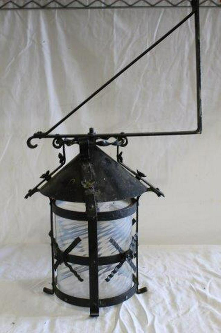 Wrought Iron Primitive Wall Sconce With Blue Opal Swirl: Great fry glass wall sconce with wrought iron mounts. Normal use and wear as shown, see photos for details.