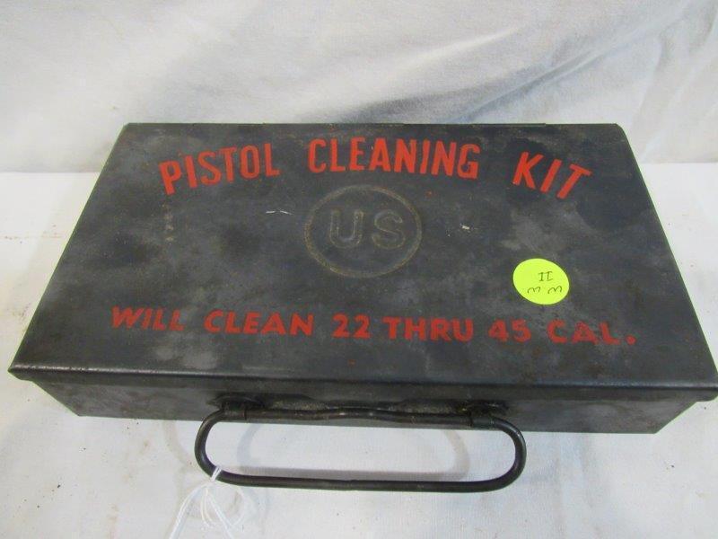 World War II pistol cleaning kit: Includes several handy oilers and several brushes. Will clean .22 through .45 caliber.