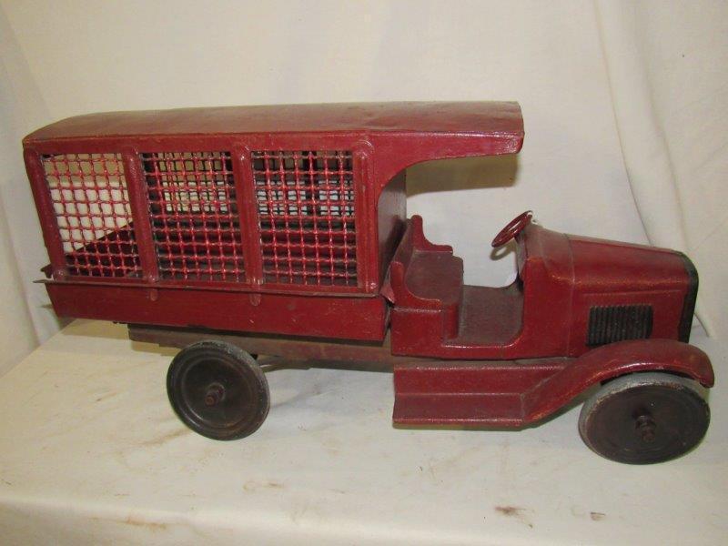 Buddy L Express truck: Has been repainted at some point. Is missing rear swing doors. Overall length is approximately 25 in