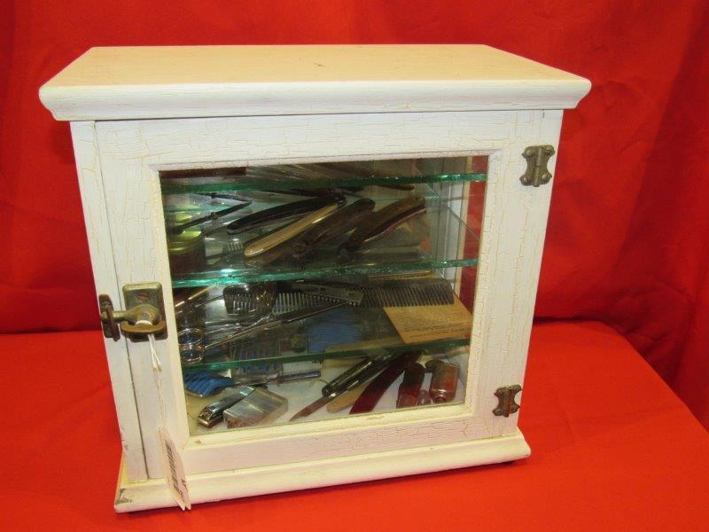Barber cabinet with razors etc.: Includes 4- complete razors and several other just handles only, scissors, clippers, Barlow knife and more. Cabinet measures 14 in wide 8in deep 13 1/2 in tall