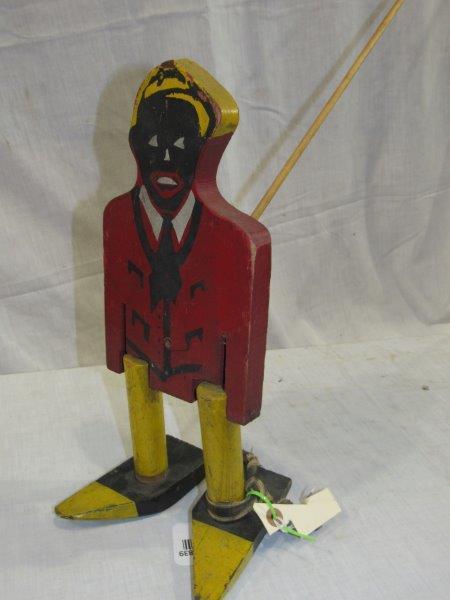 The Funny Store Wonder Man Walker: Black memorabilia. 13 1/2 in tall
