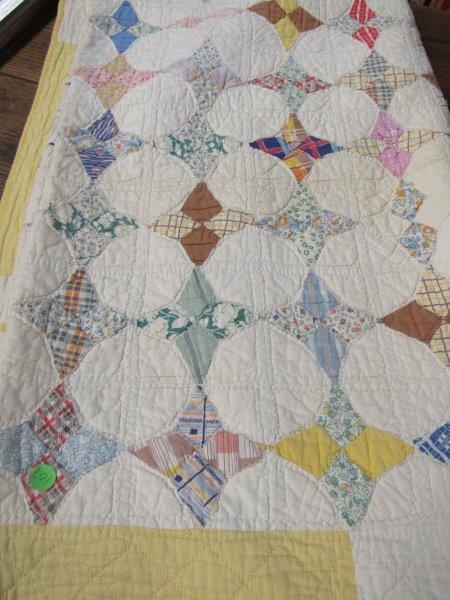 Vintage Quilt: Very light soiling/surface dirt. Appears handstitched. Some minor spots of fraying. Overall fine condition. 72" x 84"