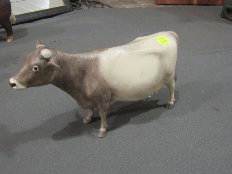 Swiss dairy cow figurine (1 of 2)