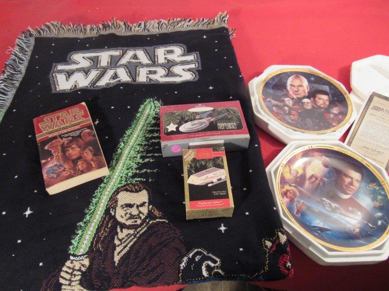 Star Wars & Star Trek mixed lot: This lot includes 2- Collector Star Trek Plates w/ certificates, a throw and 2 Hallmark ornaments NIB w/ a Star Wars book 