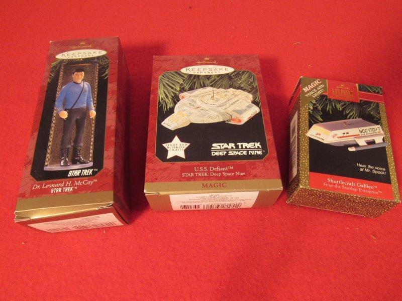 Lot of 3-Star Trek Hallmark ornaments NIB: Included are USS Defiant Deep Space Nine, Dr. Leanord H McCoy, Shuttlecraft Galileo all are new and never opened and would make a great addition to any collection. 