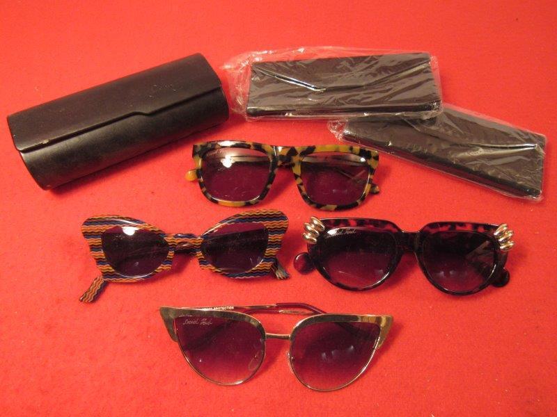 Lot of 4-David Ford sunglasses and cases: 4 pairs of David Ford sunglasses including one pair of custom order child pair along with 3 cases. 