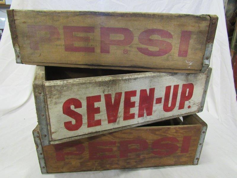 3 soda crates: Includes two Pepsi and one 7UP.