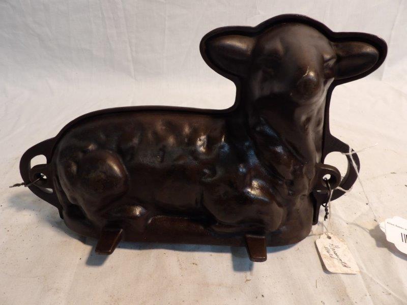 Griswold cast iron lamb mold: Approximately 13 in Long 7 1/2 in tall.