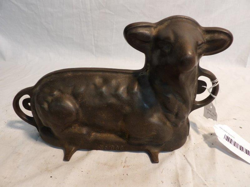 Griswold No. 866 lamb mold: Approximately 12 1/2 in Long 7 1/2 in tall.