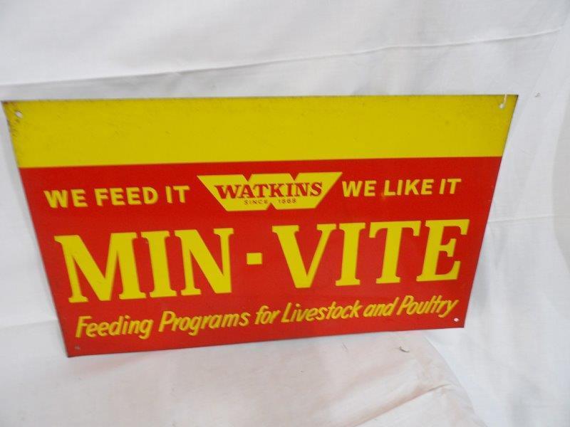 SST Watkins Min-Vite sign: Has minor edgeware and some scuffing but overall has great colors and is in decent condition! 12 in x 20 in.