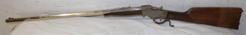 Stevens 22 caliber long rifle: With chromed or nickled octagon barrel and receiver. Stock shows wear and is missing butt plate. Otherwise is a nice clean gun. Has the number 522 on side of receiver and serial number 410 under trigg