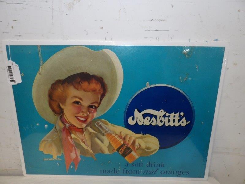 Nesbits of California cardboard store sign: Is Marked Showalter. Does not have a lot of edgeware but has several scuffs and a few nail or pin pricks or punctures. Great graphics of cowgirl with bottle!! 17 1/4 in x 24 1/4 in. Is preserved on po