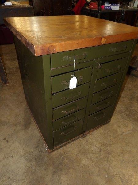Industrial 11 drawer metal cabinet with block top: 28 in wide 27 in deep 33 in tall.
