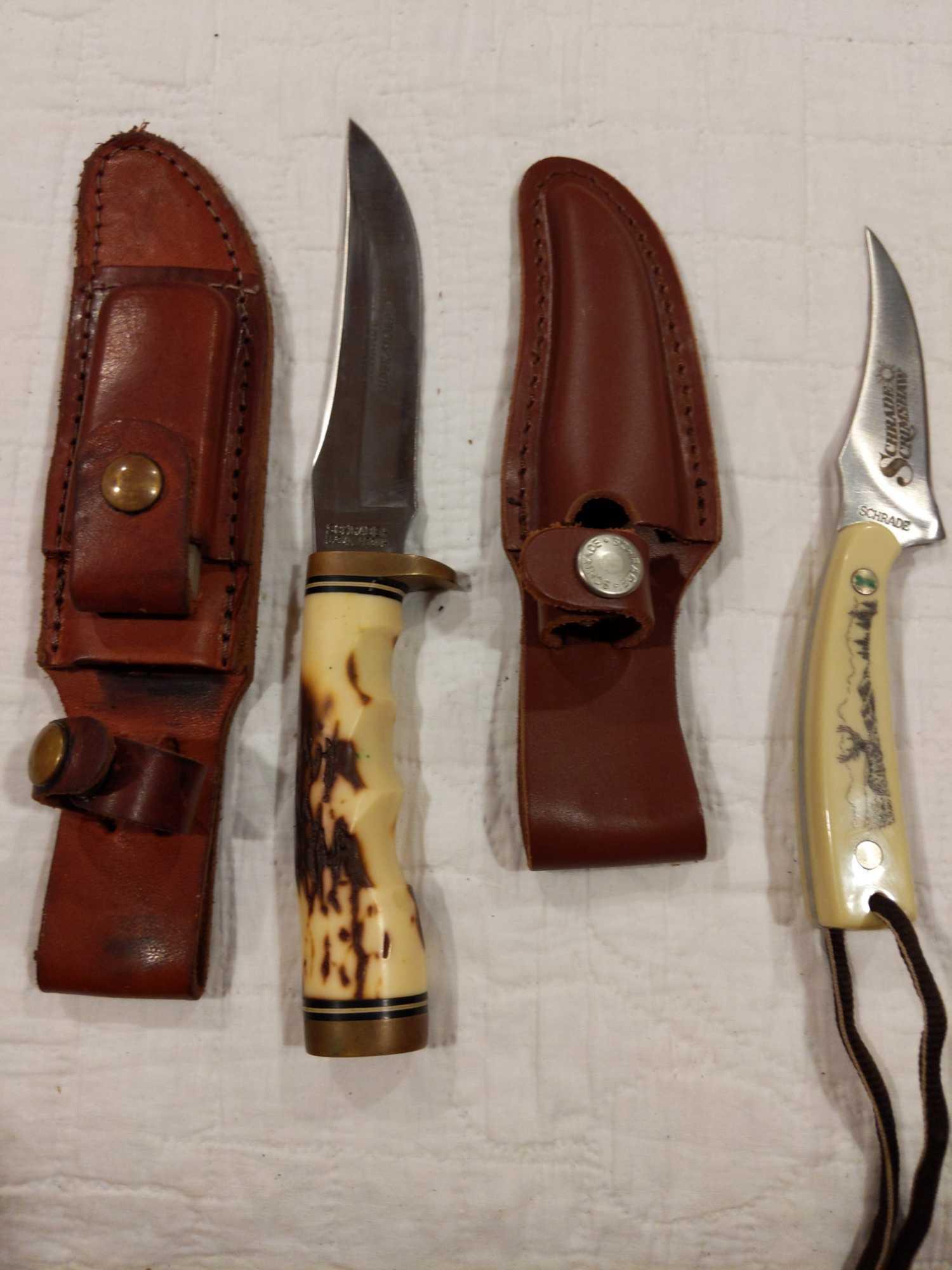 2- Schrade 153UH & 1520TYD fixed blade knives: Schrade Uncle Henry Golden Spike with 4 7/8-in blade 9 1/4 in overall. Schrade scrimshaw knife that has a 3 and 1/4 in blade and is 7 in Long. Both are new with leather sheath.