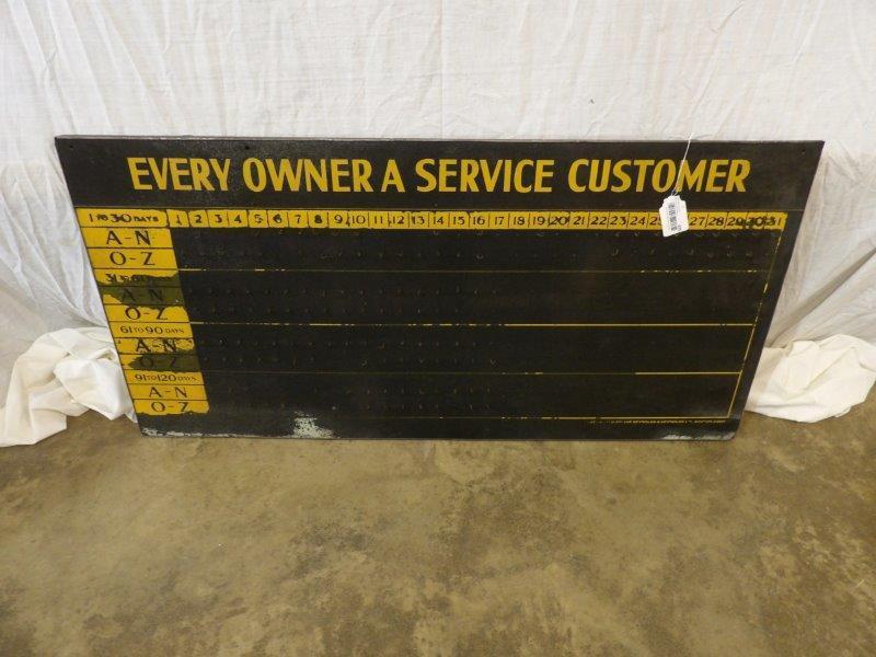 Masonite customer service display: This is Masonite with metal frame on plywood. About a third of the peg hooks are missing. Is marked distributed by the Reynolds & Reynolds Co. Dayton, Ohio. 24 in x 48 in.