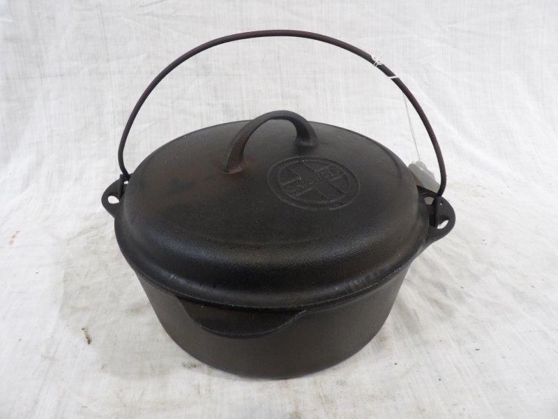Griswold #8 cast iron Dutch oven: Interior is smooth and clean exterior has minor pitting. Large block logo.