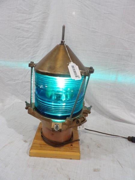 Nautical Ships Beacon lamp: Very unusual piece with heavy Blue Glass globe. Weighs 48 lbs. Is wired for display and lights up. Approximately 9 in in diameter overall height is 22 in.