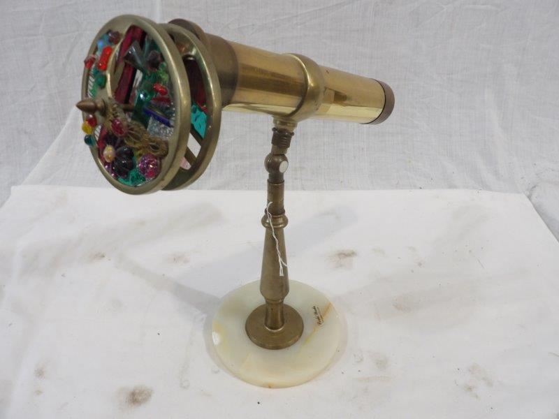 Great brass kaleidoscope on marble base: Appears to be great condition!! Overall length of top piece is approximately 14 in and is 14 in tall.