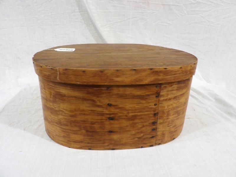 Large oval wooden pantry box: 21 inches long 14 in wide 10 in tall. Has a great look!!