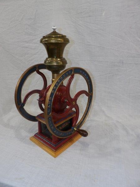 Outstanding restored The Swift Mill Lane Bros. coffee: Millbrook, New York. Great restored coffee mill does have a few pics to paint but overall has an excellent look! Wheels are 14 1/2 inches in diameter overall height is 25 1/2 in.