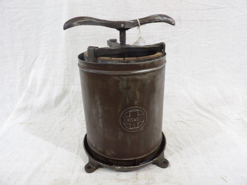 Griswold Erie No.110 fruit press: With wood interior. 18" tall.