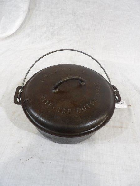Griswold No. 9 cast iron Dutch oven w/ trivet: Is in excellent condition!! Appears to be seasoned and ready to use. 11 in in diameter.