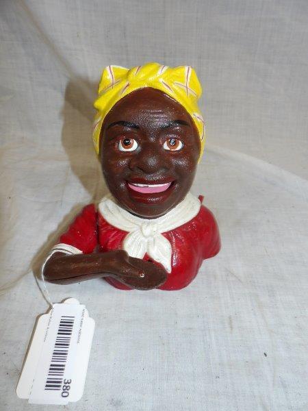 Aunt Jemima cast iron mechanical Bank: This is a newer Bank manufactured by John Harper and Company England. 6 in wide 7 in tall.