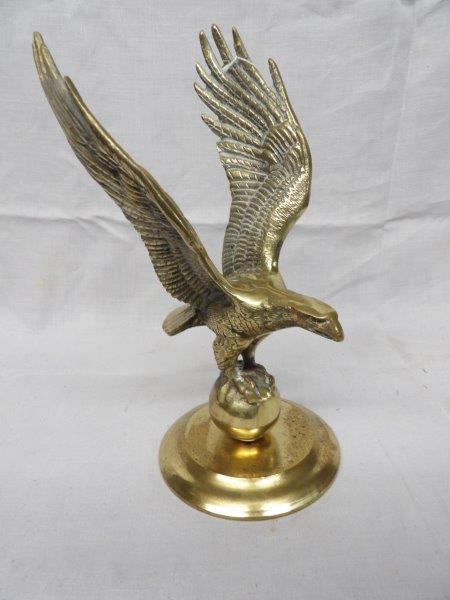 Brass eagle in flight (1 of 2)