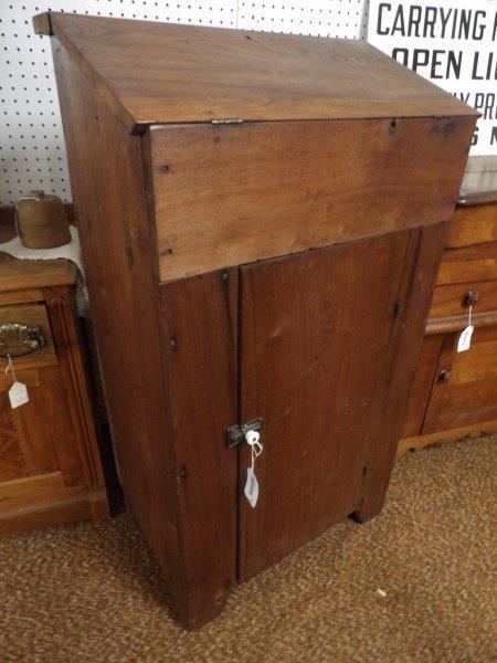 Slant front cabinet with door (1 of 3)