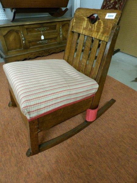Mission quarter-sawn Oak rocker: With upholstered seat which is clean. Height to top of back is 28 in.