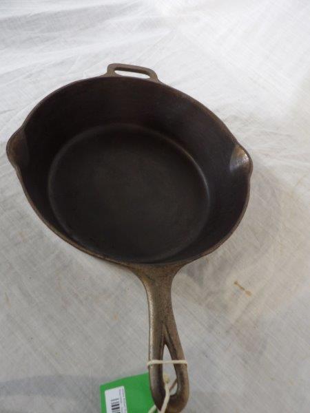 Griswold No.90 double Skillet bottom: Minor pitting on interior overall is good and clean.