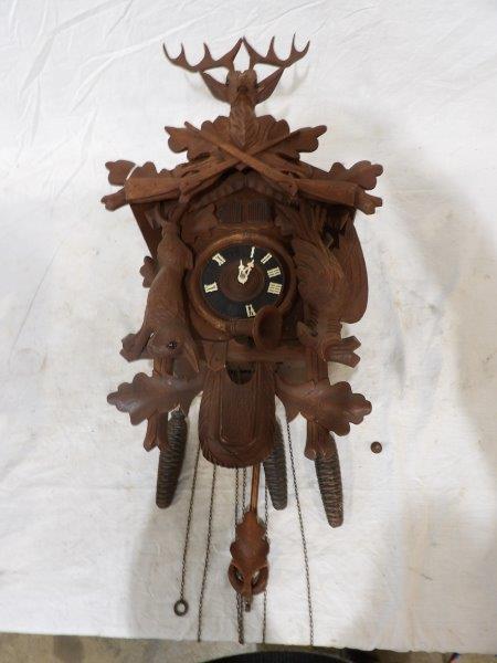 Cuckoo clock: Includes wait. Has not been tested. Is missing a few numbers on dial.