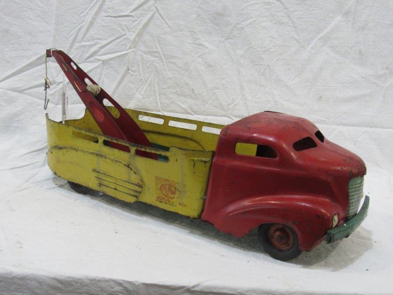 Wyandotte pressed Steel Wrecker: Shows wear and minor corrosion spotting but overall is and good solid condition. Approximately 21 inches long.