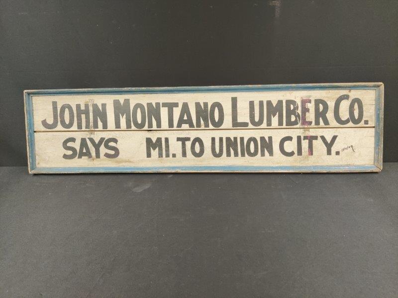 Wood John Montano Lumber Co. Sign: Single sided, with a great look. Nice blue painted frame. 12 x 48