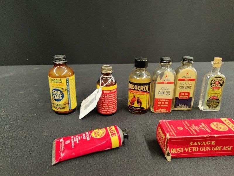 8 Piece Lot of Gun Oil Items: Includes NOS Savage grease tube with box and 2 Marlin glass bottles