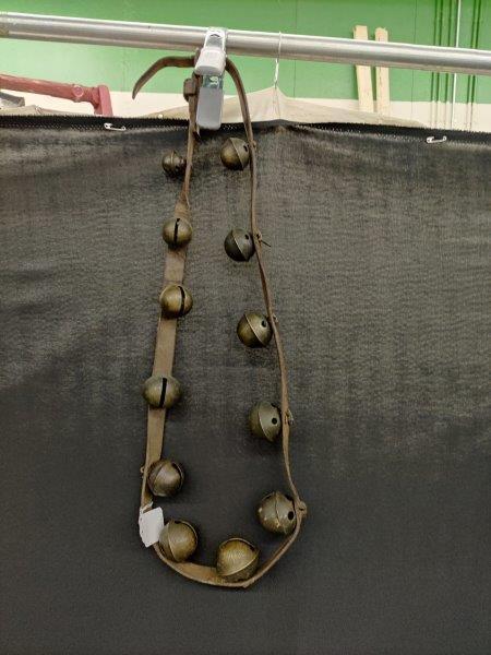 String of 12 brass sleigh bells on leather strap (1 of 3)