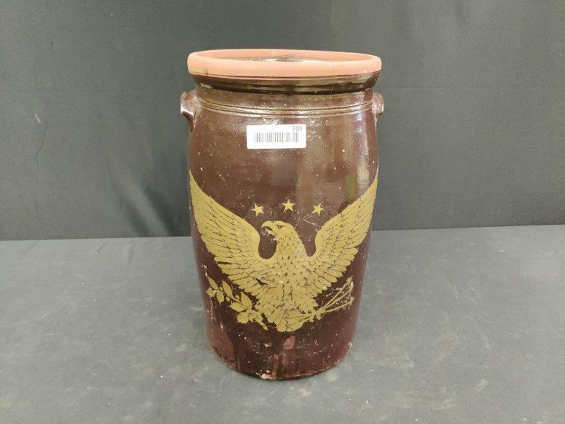 Redware crock churn with eagle: Eagle was added and is not original to piece. With hairline cracks.