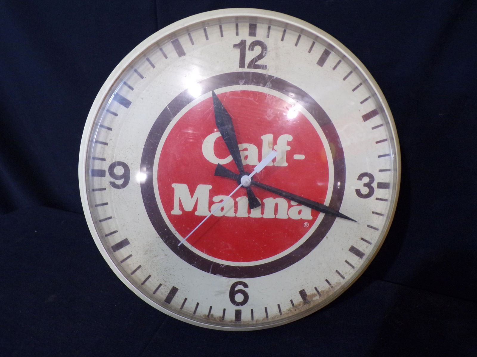 CALF-MANNA BATTERY OP ADVERTISING CLOCK (1 of 3)