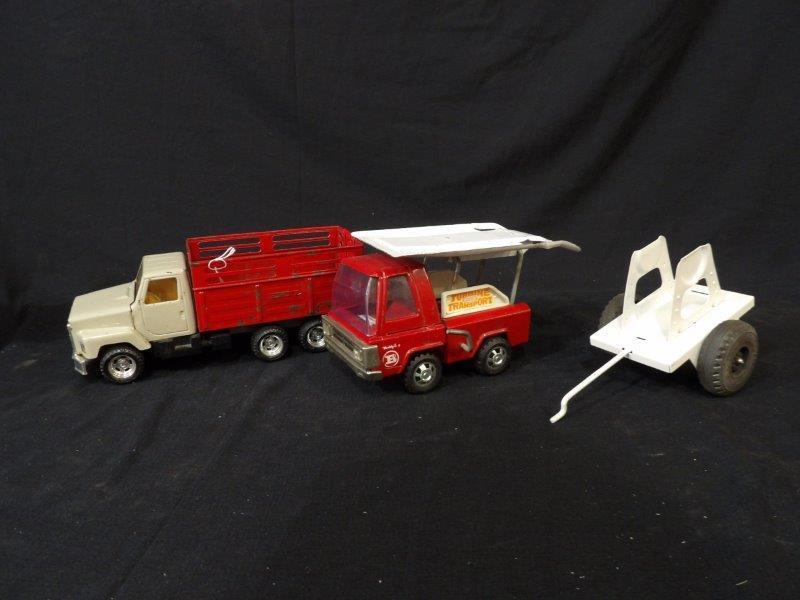 Lot of 2 Vintage Ertl & Buddy L Pressed Steel Toy Trucks and Trailer: In good vintage condition 1-Ertl # 3605 International Cattle Truck 10 1/4" L 2-Buddy L Turbine Transport 9' L 3-Buddy L Trailer