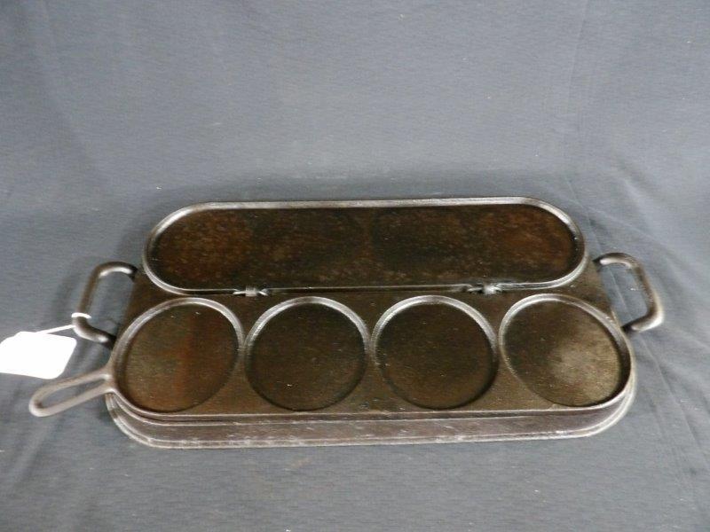 Stuart Peterson & Co. #2 flip top griddle: Shows some wear but overall is in good condition. 22 in long from handle to handle 10 in wide.