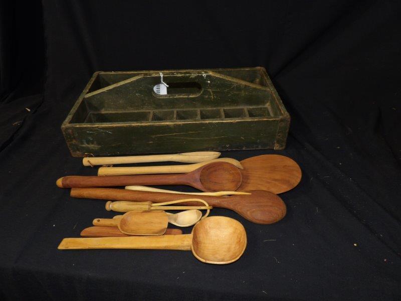 Primitive carrier with wooden utensils (1 of 5)